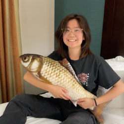 Rachel and her beloved fish plushie